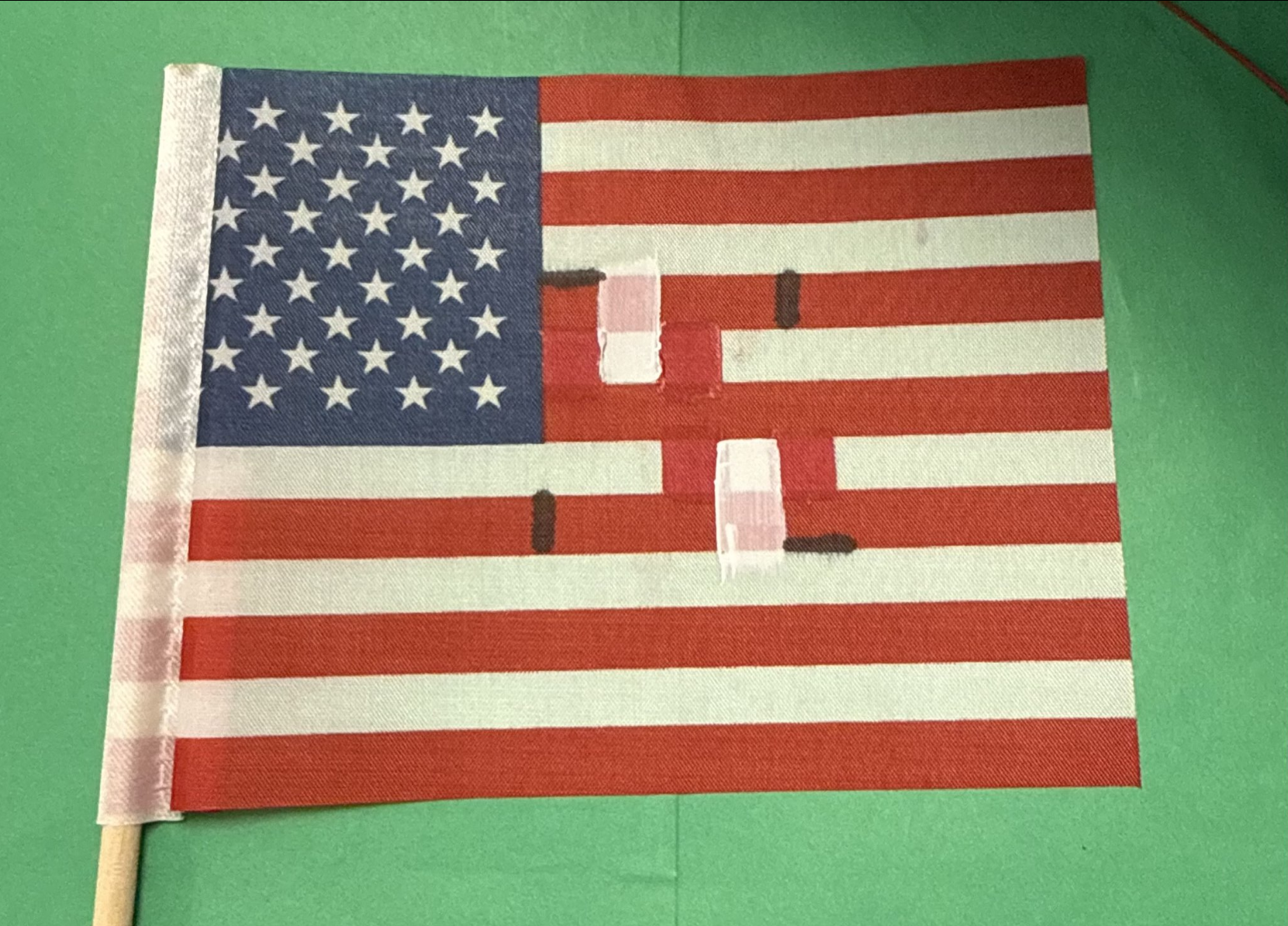 An American flag altered to include a swastika, similar to the one displayed in Rep. Dave Taylor's (R-Ohio) office, was delivered to a different GOP Hill office in February.