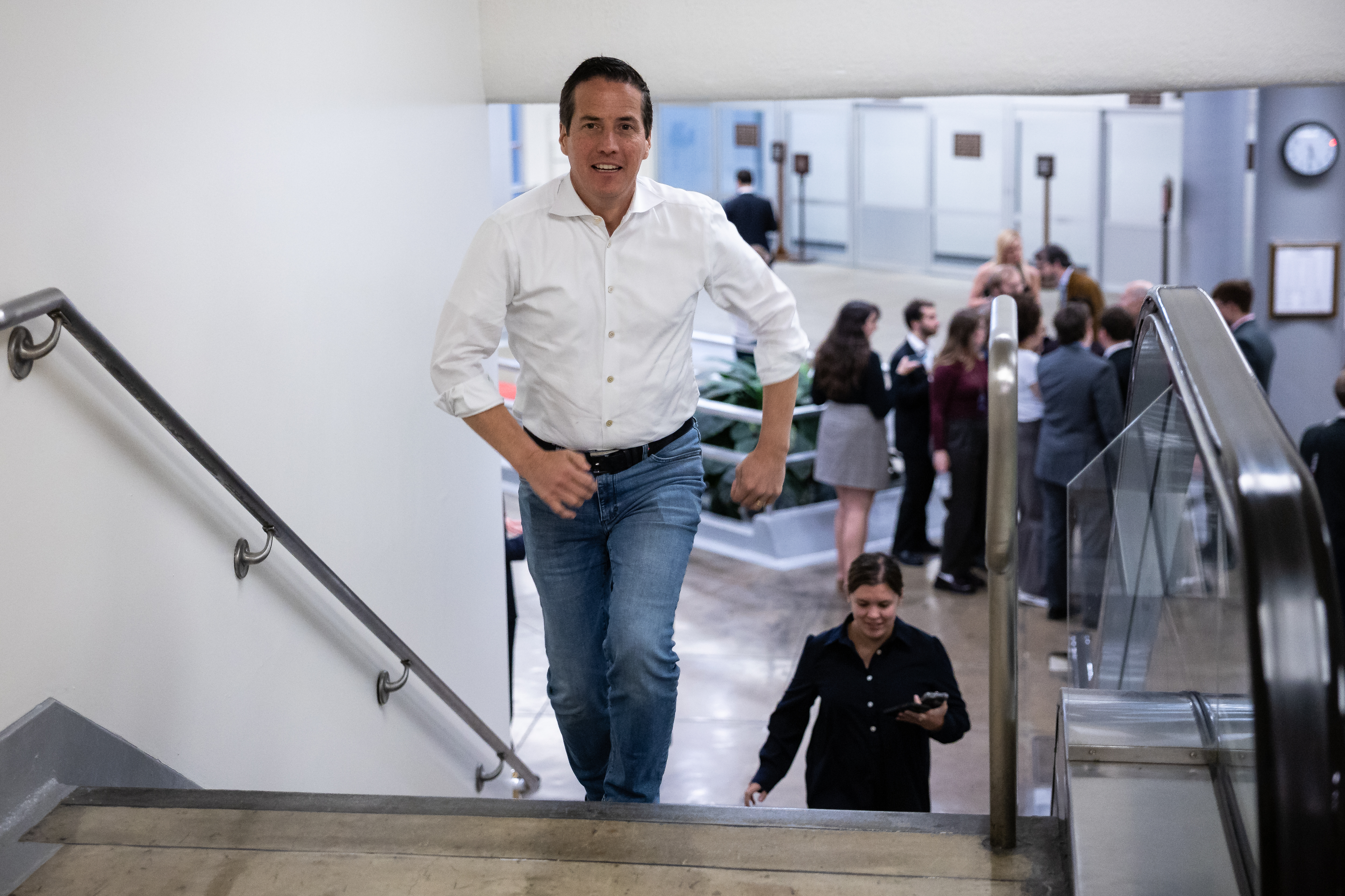 Sen. Bernie Moreno (R-Ohio) sprints to a vote at the US Capitol in Washington, on the 41st day of a government shutdown, Nov. 10, 2025.
