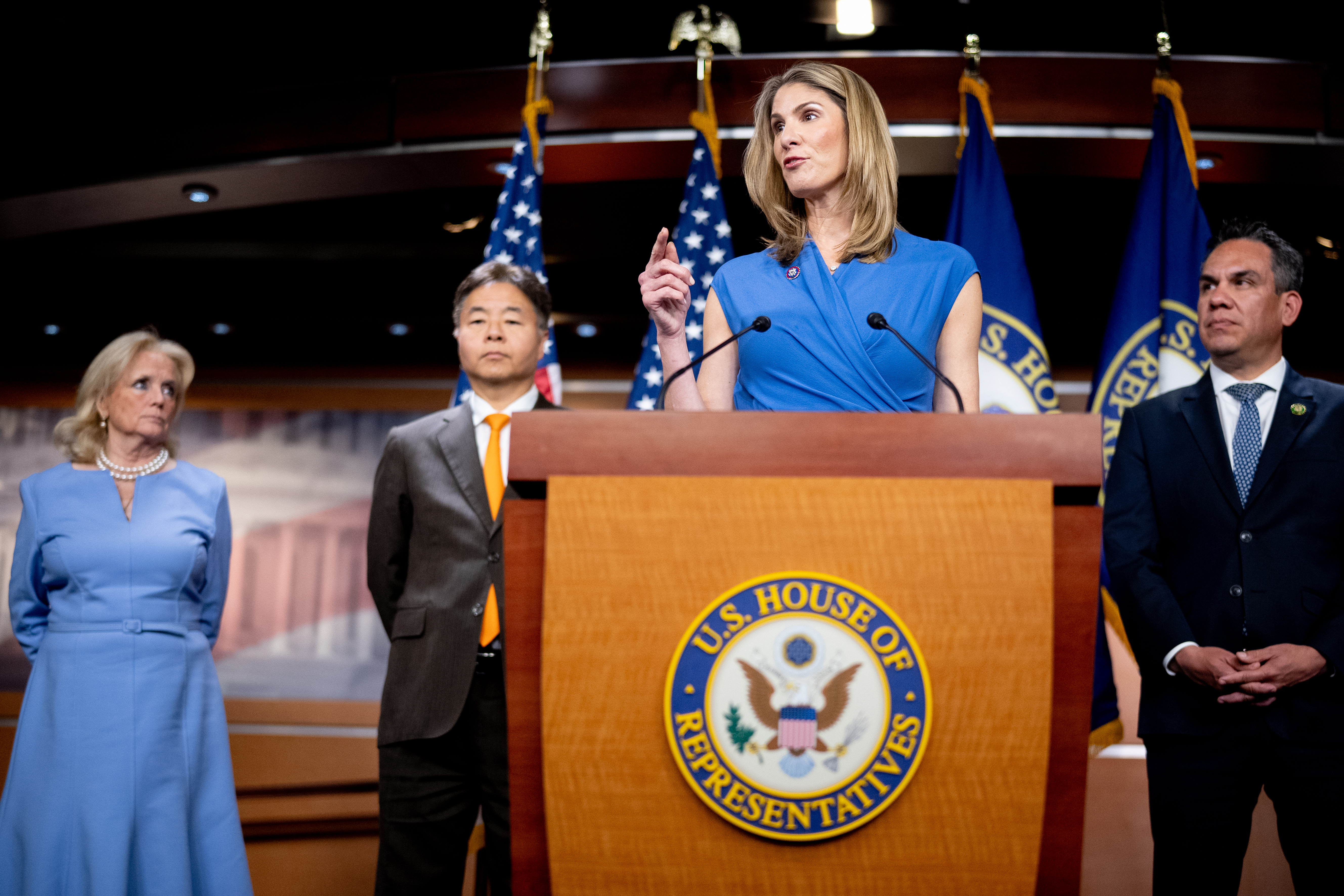 Trahan, accompanied by, from left, Reps. Debbie Dingell (D-Mich), Ted Lieu (D-Calif.) and Pete Aguilar (D-Calif.), speaks at a news conference at the U.S. Capitol in Washington in May 2024.